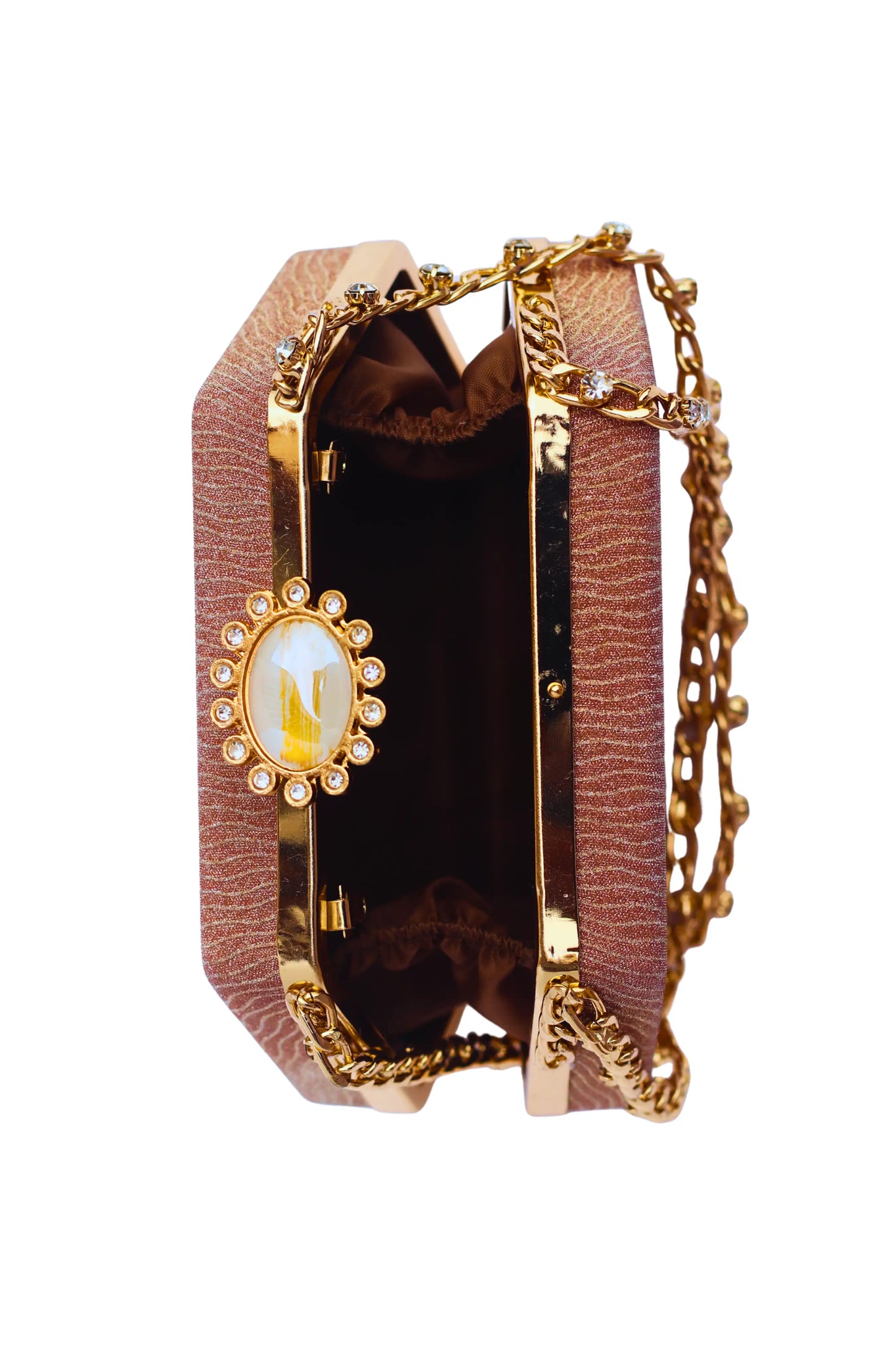 Golden brown bridal clutch bag with decorative clasp on a white background