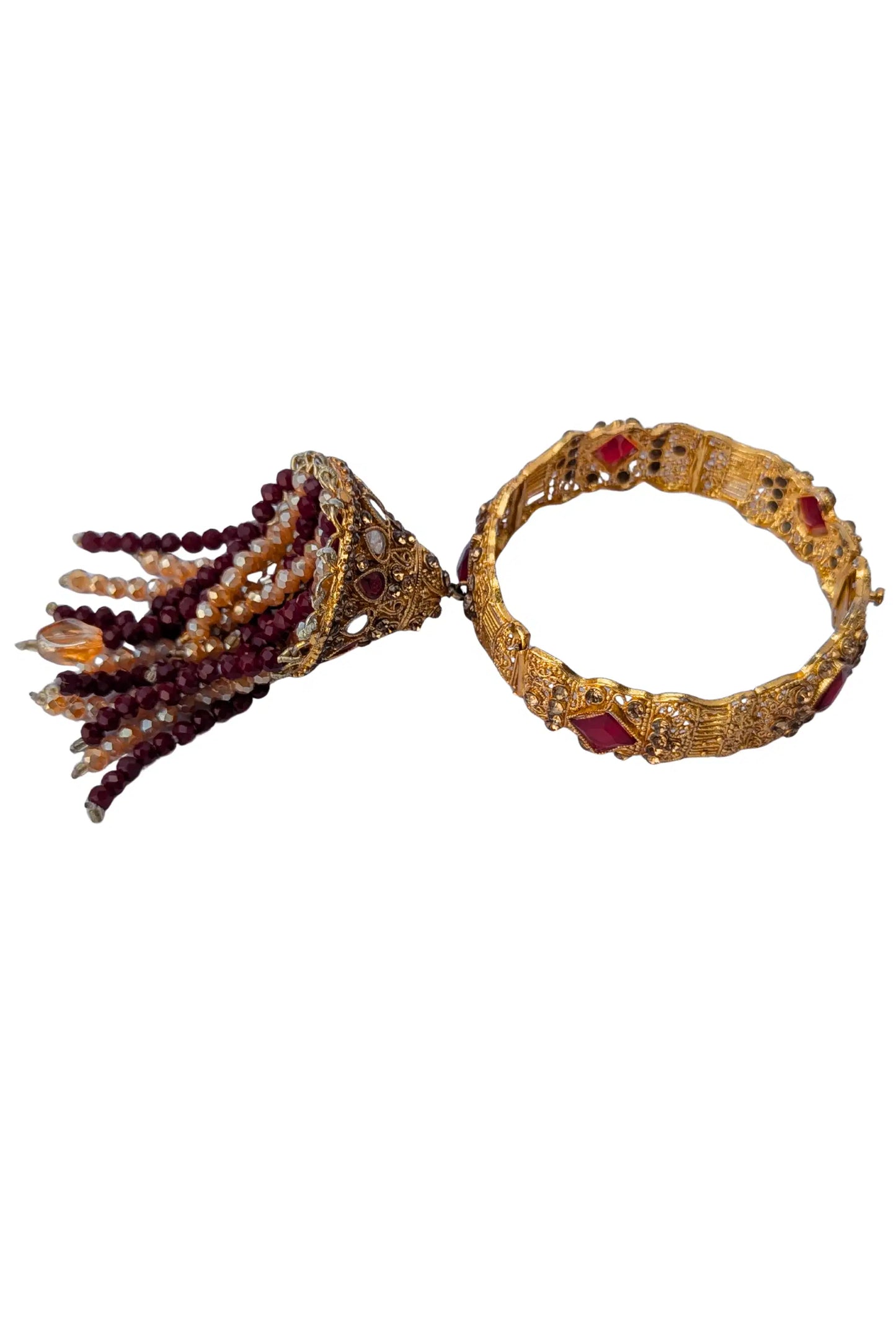 Decorative bracelet with tassel on a white background