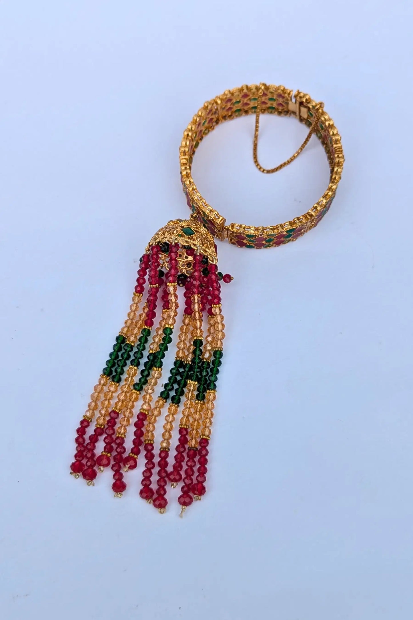 Decorative karra with beads on a light blue background