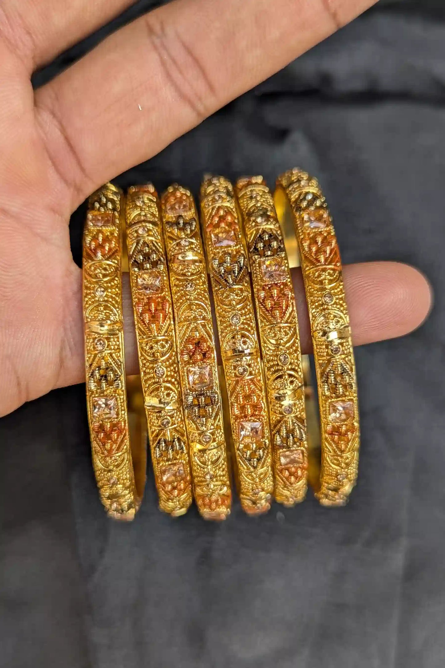 Elegant Golden Bangles with Sparkling Champagne Pearls