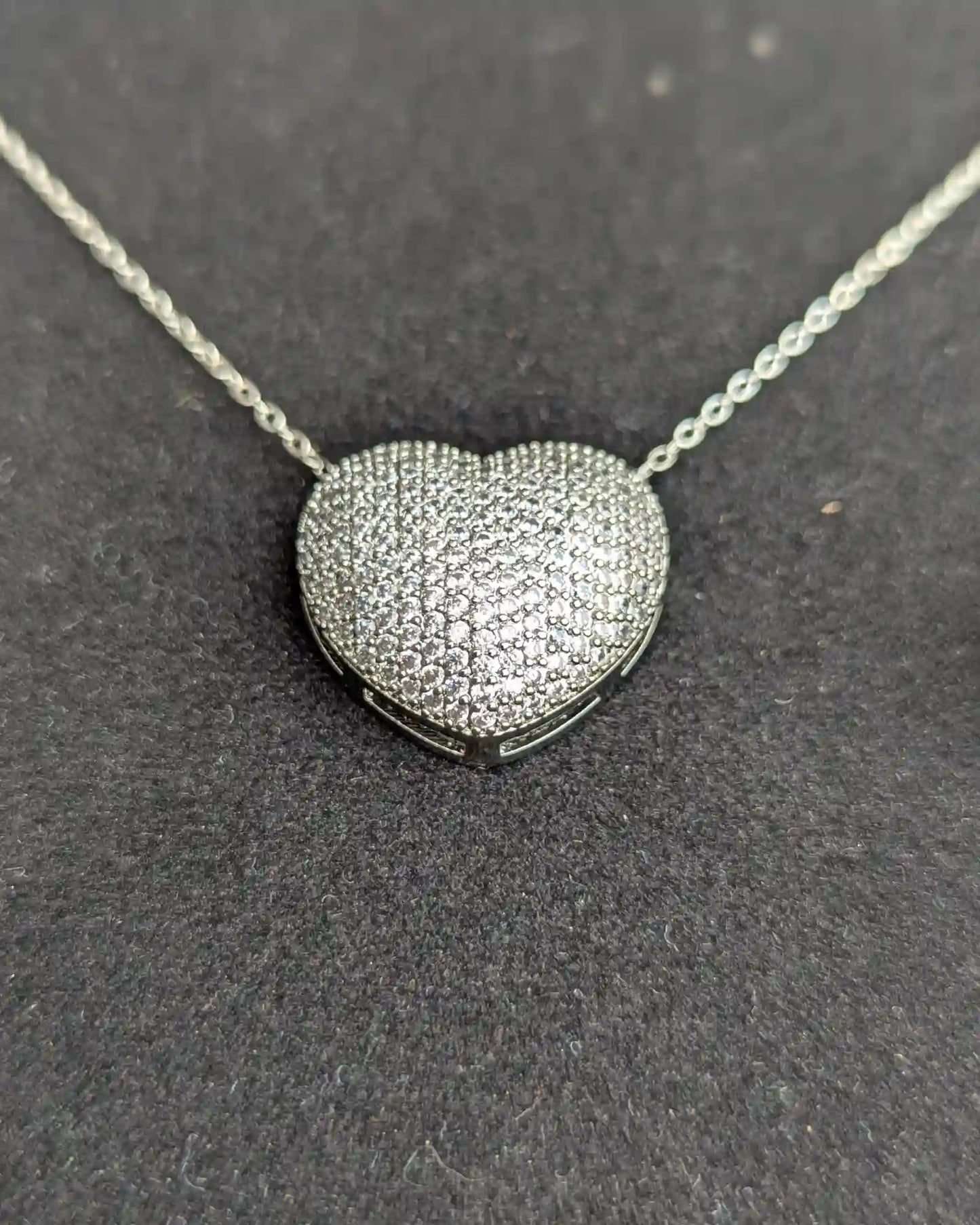 Hear shape locket with stud earrings
