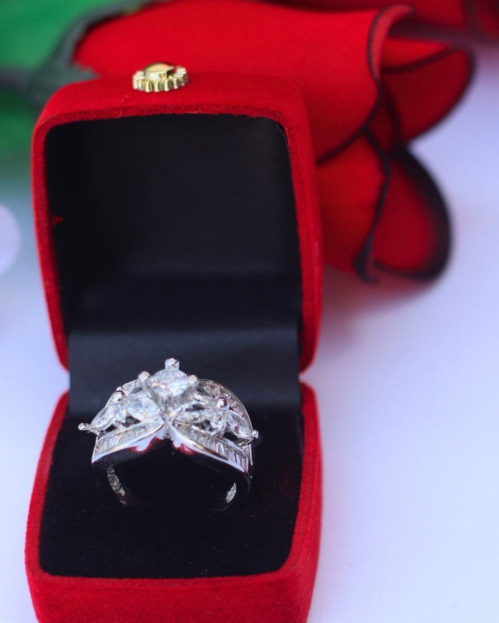 Silver color rings for women in a red box