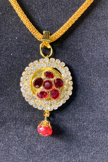 Golden Pendant Necklace and Earrings Set with Red Stone Accents