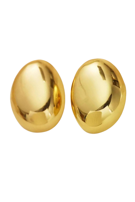 Pair of gold earrings on a white background