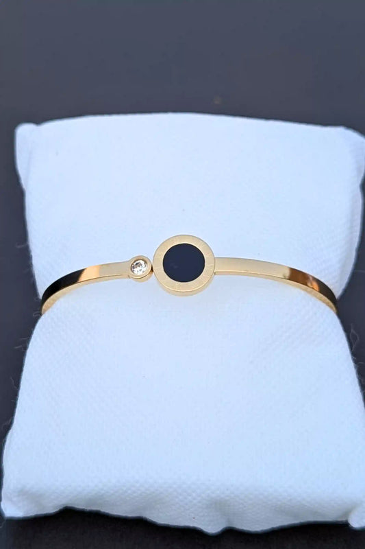 Minimalist Gold Bracelet with Black Accent and Sparkle