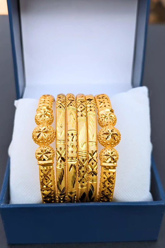 Golden Engraved 6-Piece Bangles Set – 4 Bangles and 2 Karray