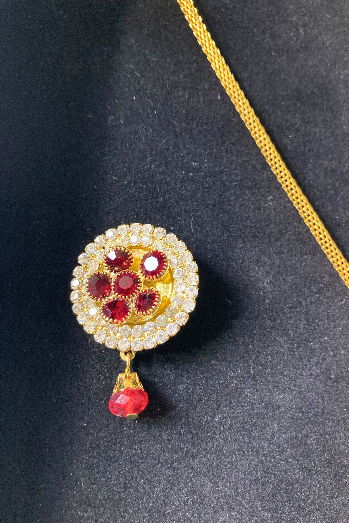 Golden Pendant Necklace and Earrings Set with Red Stone Accents