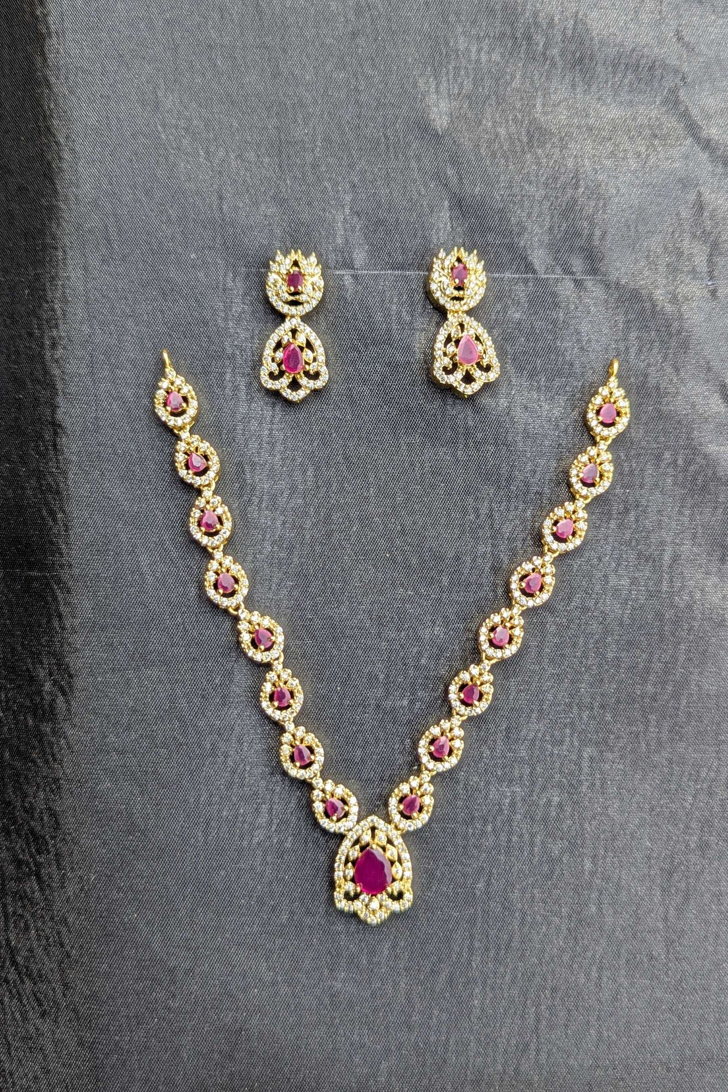 Golden Necklace and Earrings Set with Deep Red Stones - NKL 132