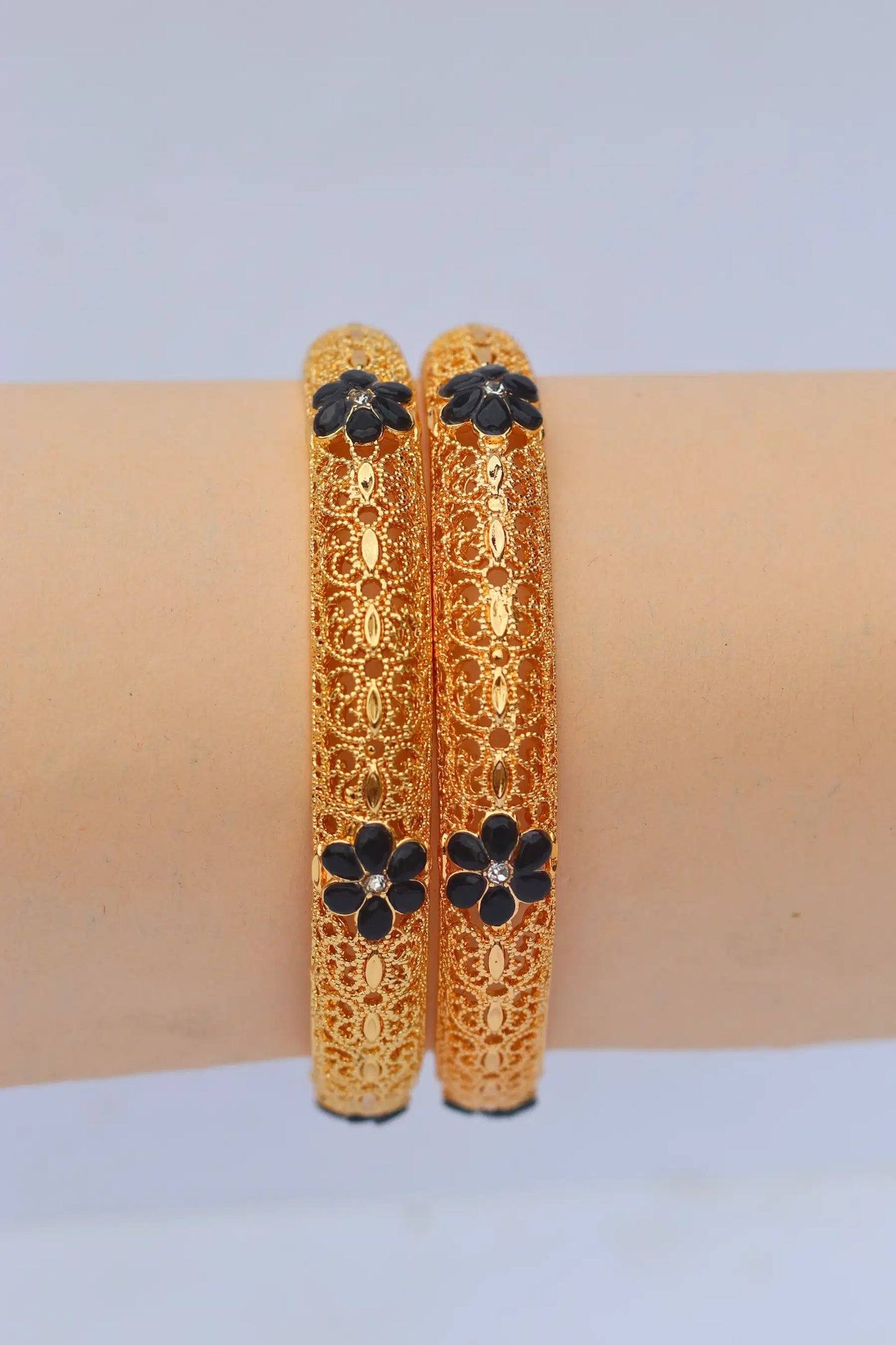 Golden Karray – Bangles for Girls with Black Flower Design on hand