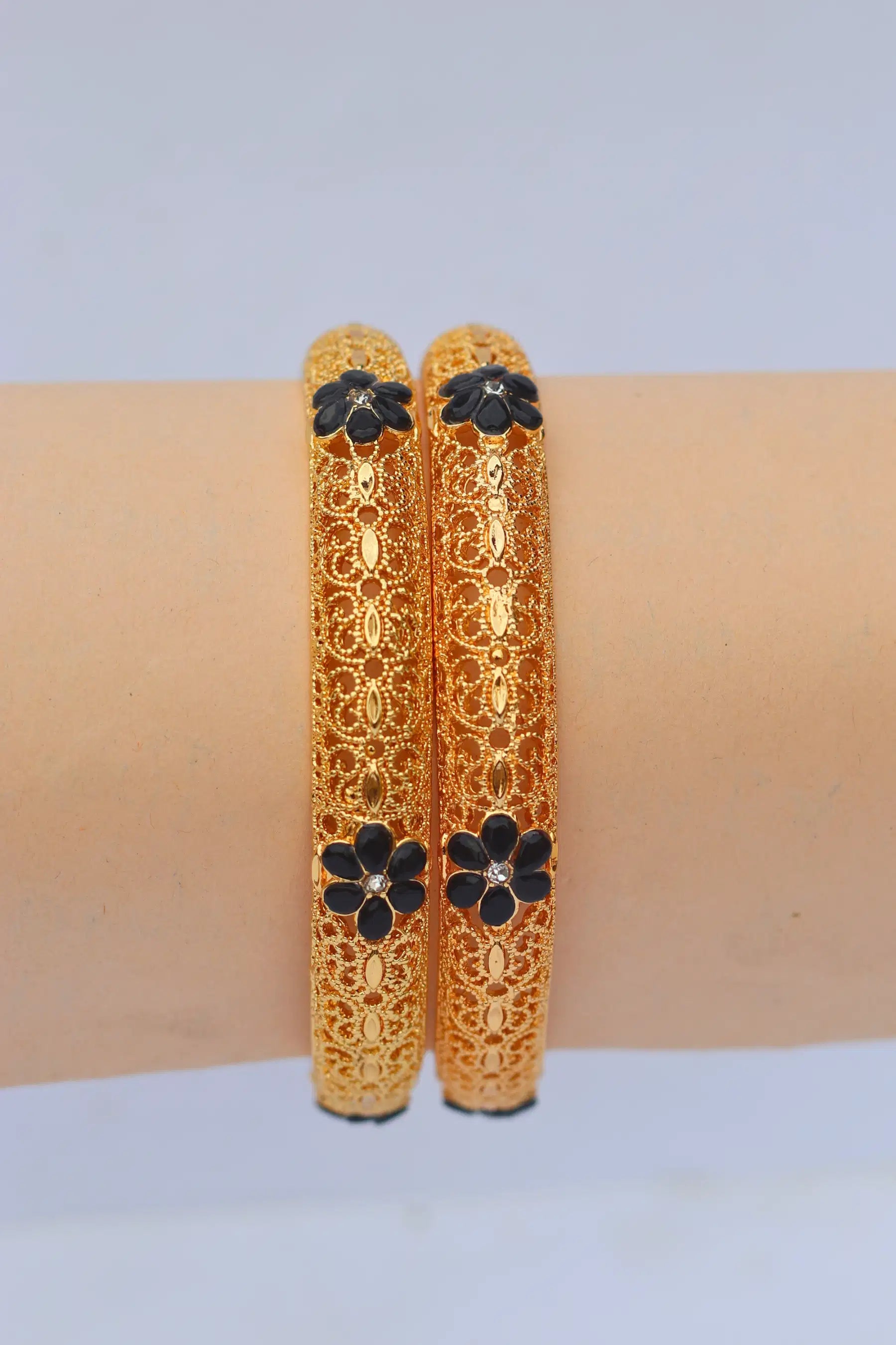 Golden Karray – Bangles for Girls with Black Flower Design on hand