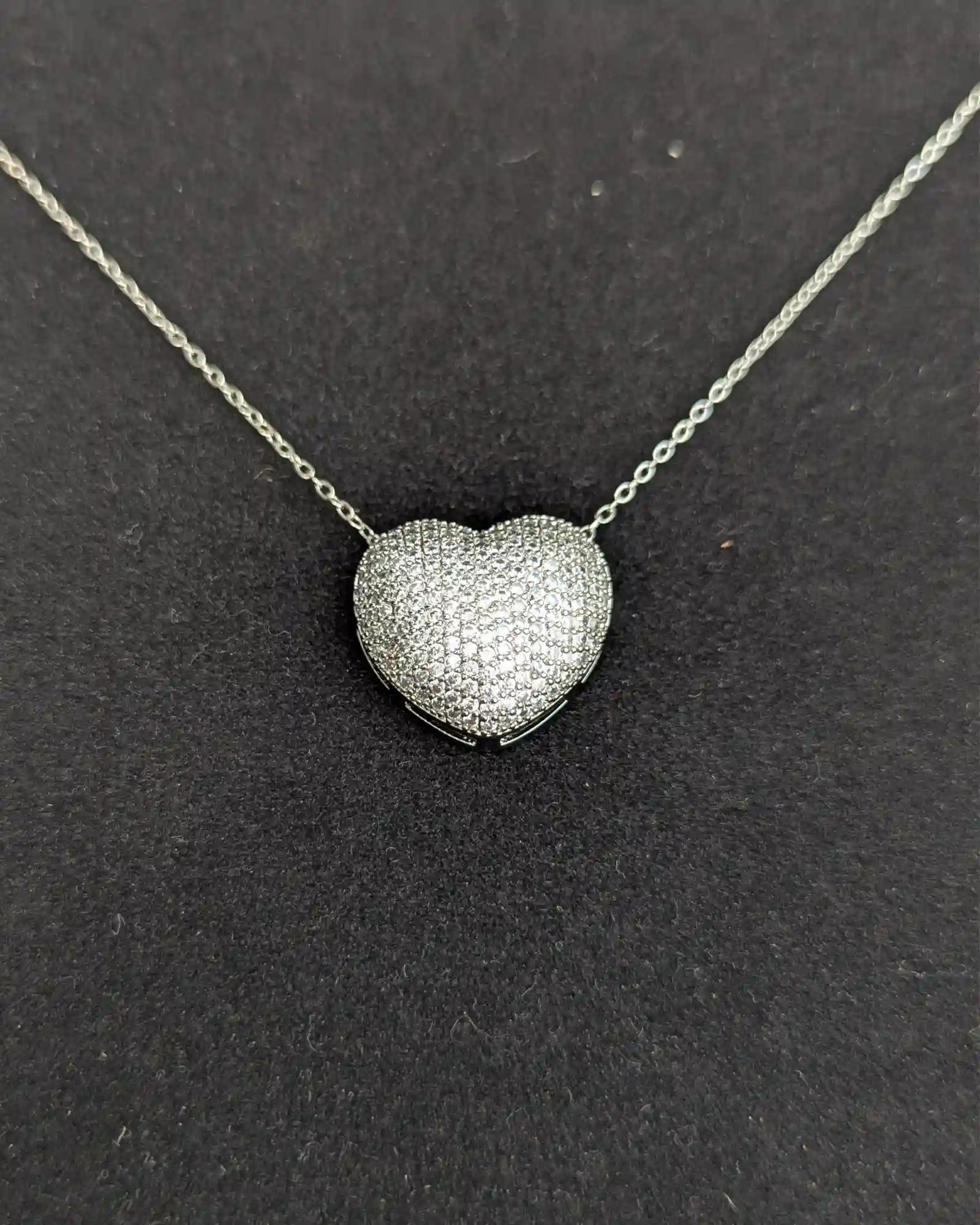 Hear shape locket with stud earrings