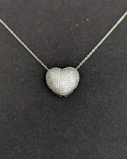 Hear shape locket with stud earrings