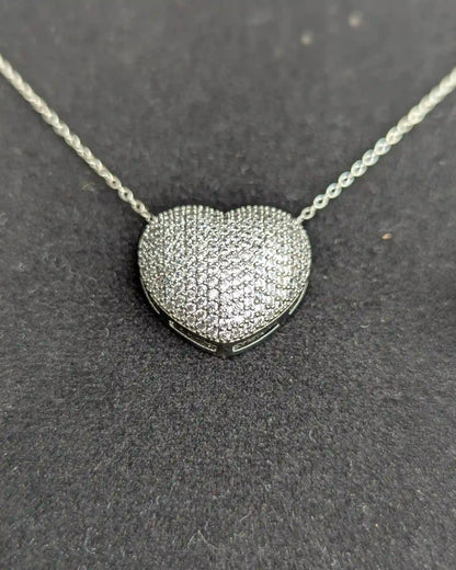 Hear shape locket with stud earrings