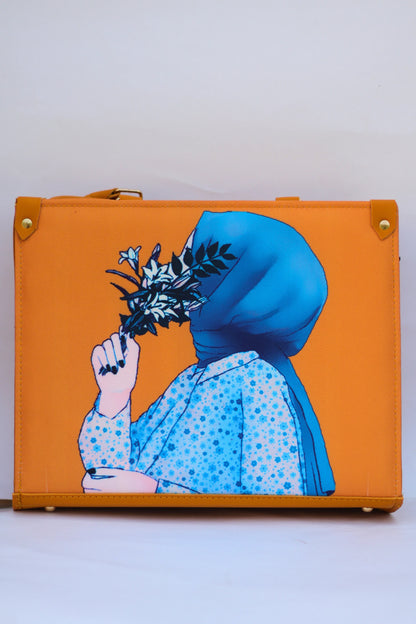 Orange suitcase with a design of a person in a blue headscarf holding flowers on a white background