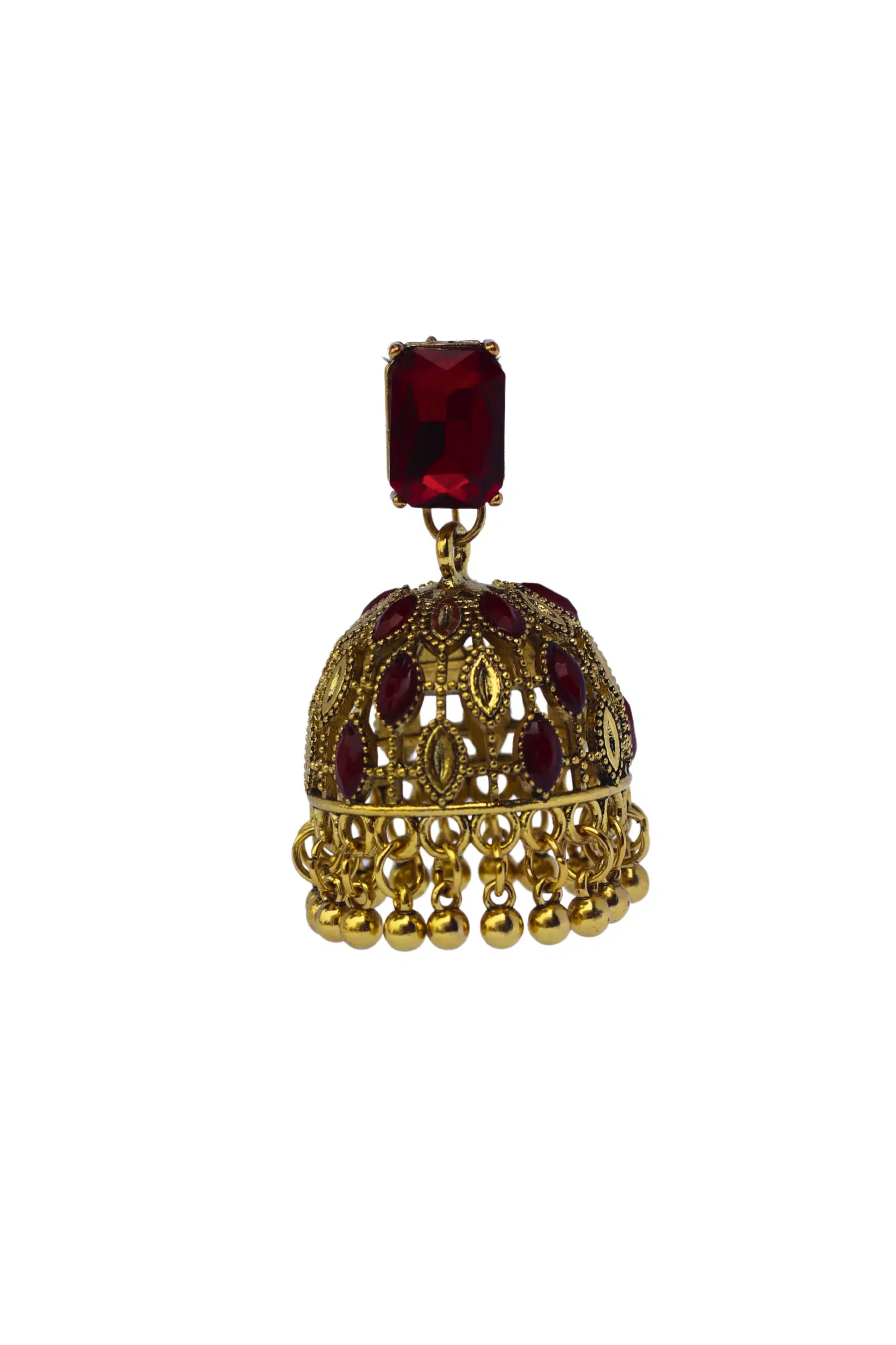 Pair of gold and red earrings on a light gray background
