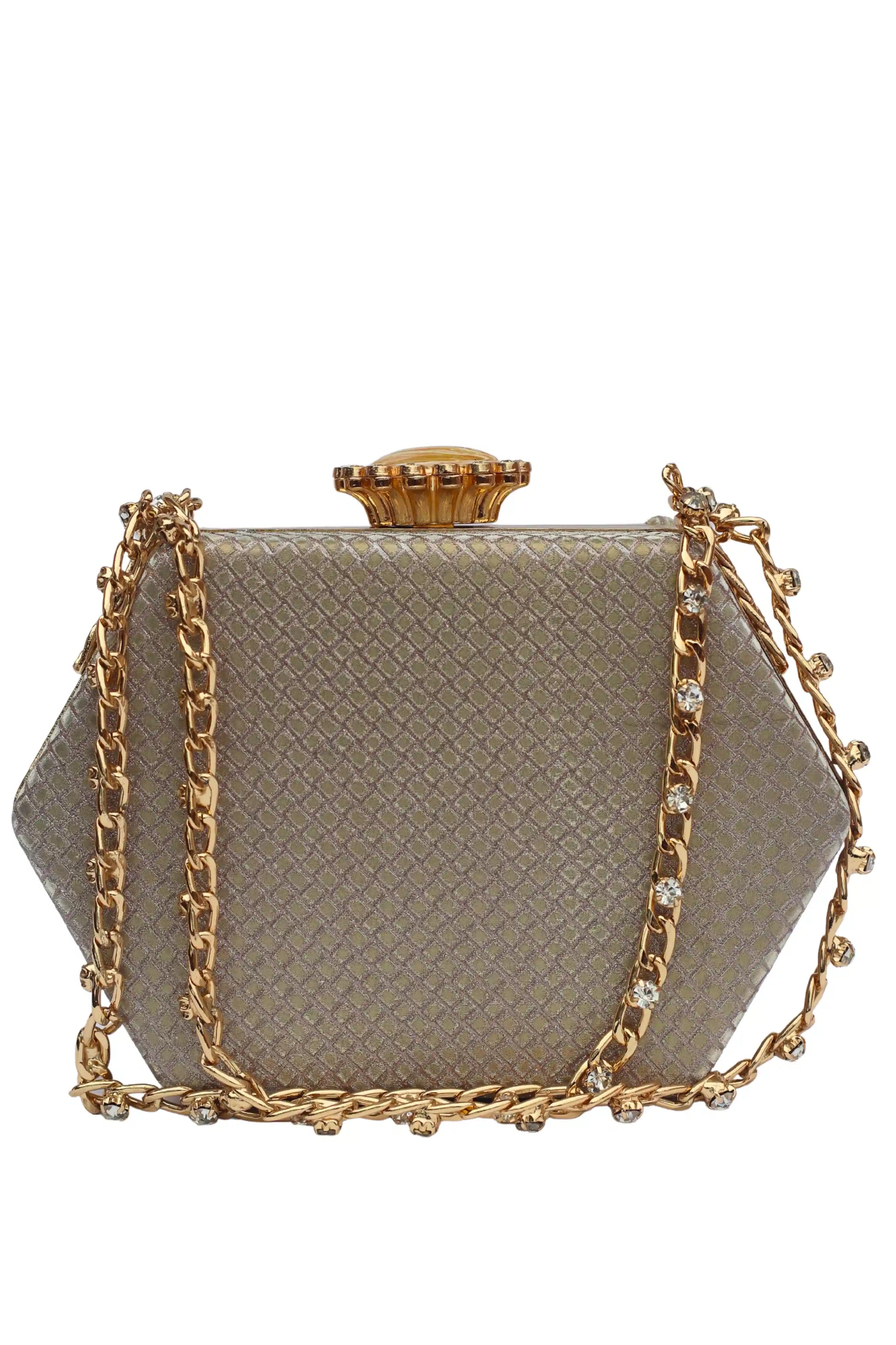 Gold clutch bag with chain strap on a white background