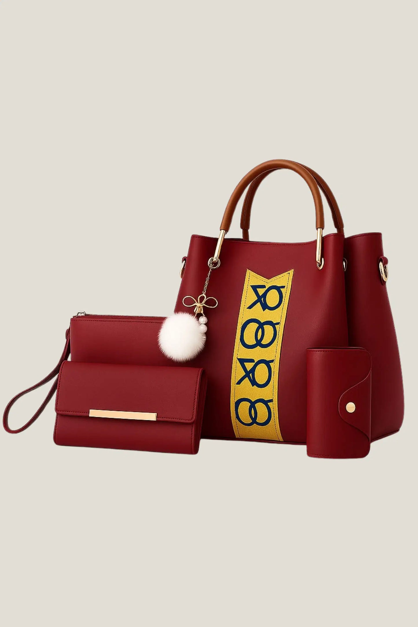 Red handbag with yellow and blue pattern on a beige background